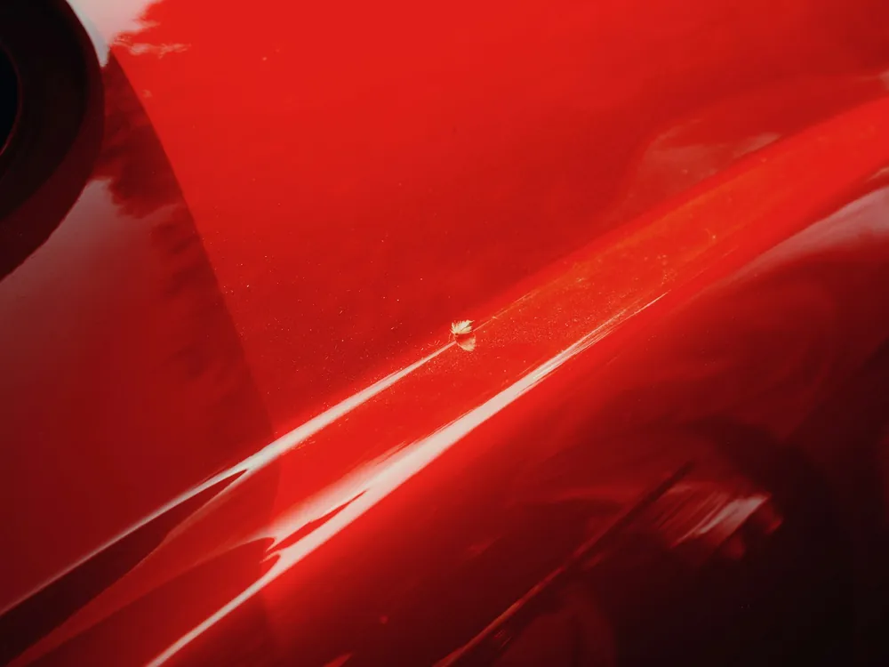 Glossy red paint up close